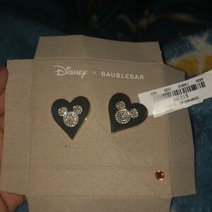 I’m selling some Disney Mickey Mouse earrings so the color is gold and silver